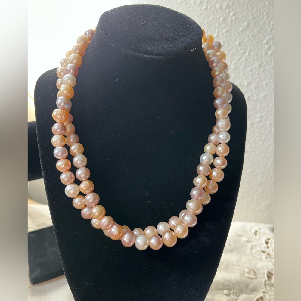 Beautiful 10 mm genuine cultured pearls in natural multicolor strand.